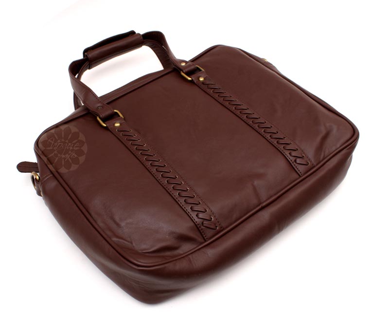 Vogue Crafts & Designs Pvt. Ltd. manufactures Brown Roomy Bag at wholesale price.